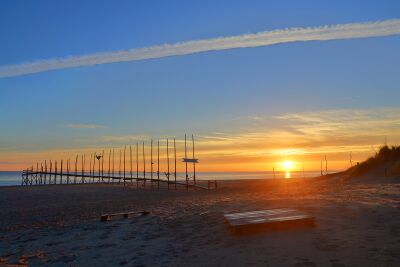 Zonsopkomst bij de steiger van het Waddenveer bij Kaap Noord op Texel