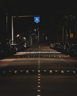 Endless Street With Illuminated Zebra Crossing